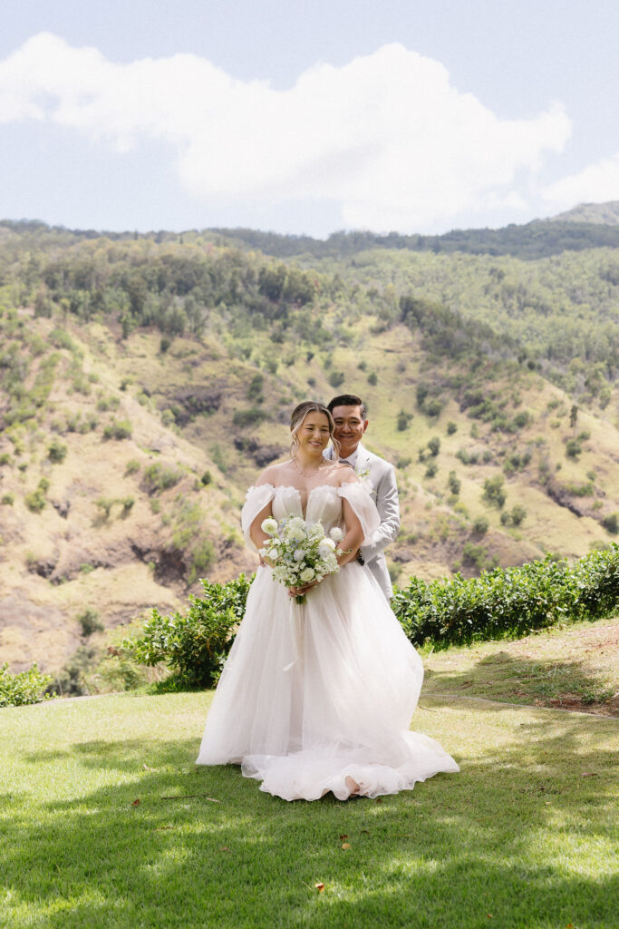 cute picture of the bride and groom hugging during their bridal portraits