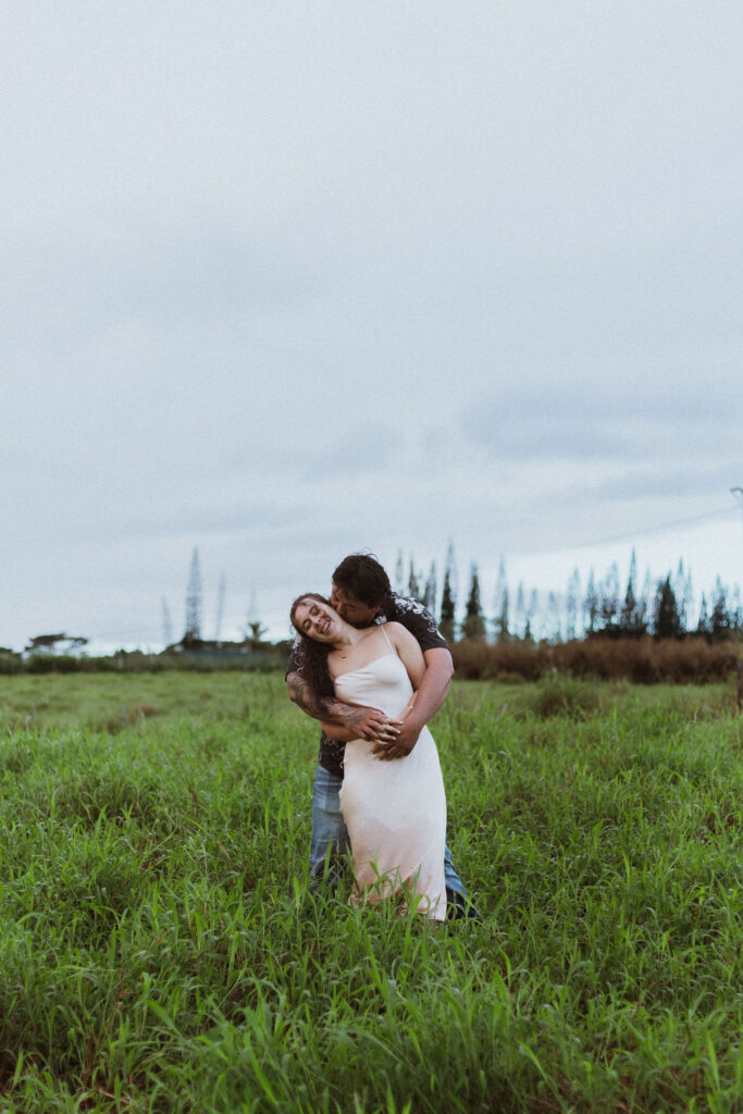 cute picture of the couple hugging during their photoshoot