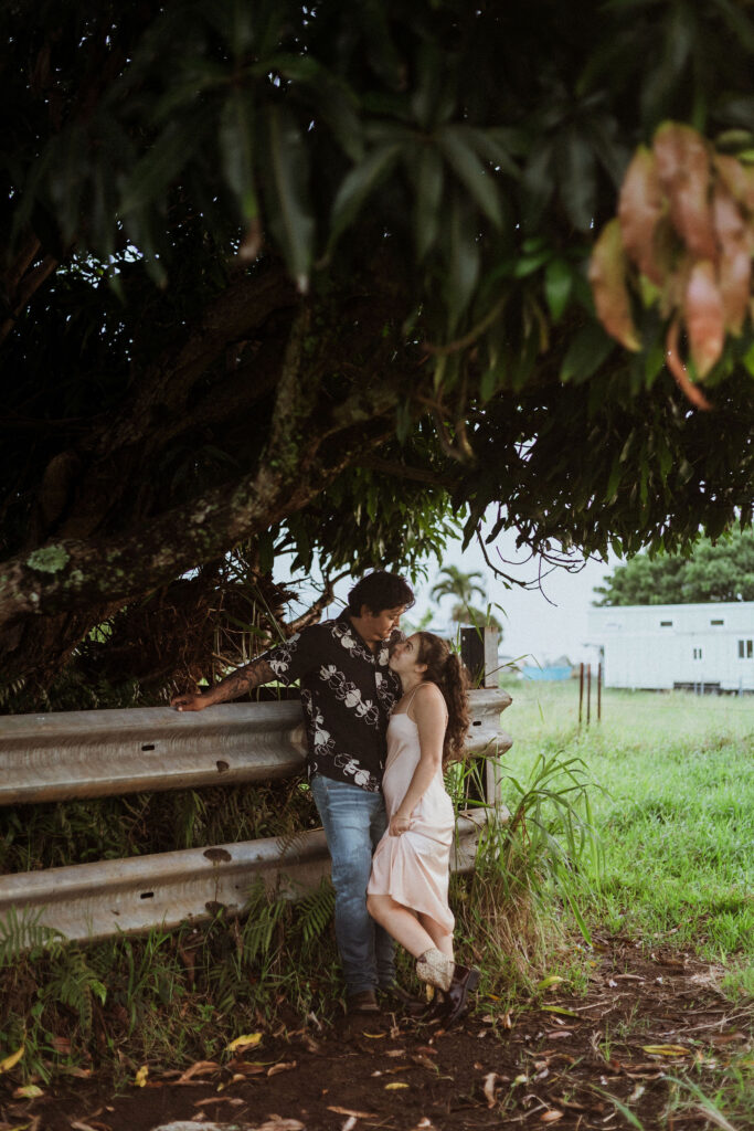 cute picture of the newly engaged couple smiling at each other