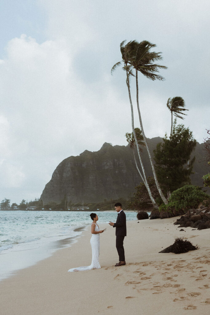 bride and groom emotional reading their vows
