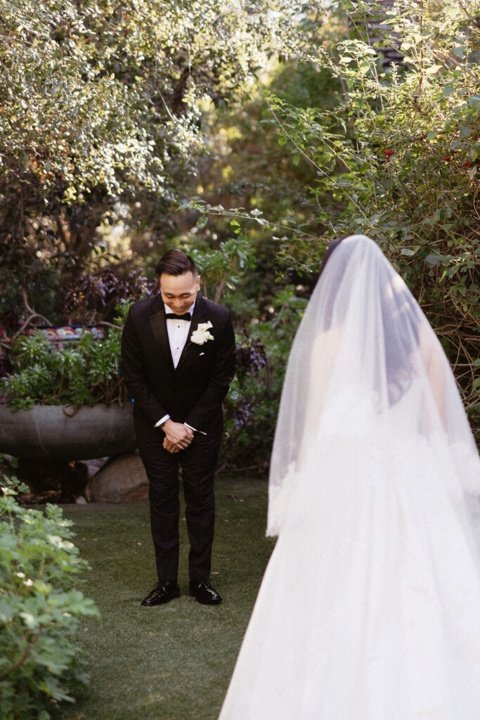 cute picture of the bride and groom at their first look