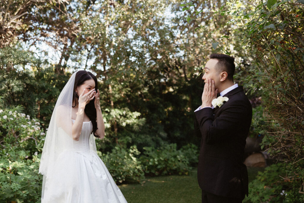 groom emotional seeing the bride in her wedding dress