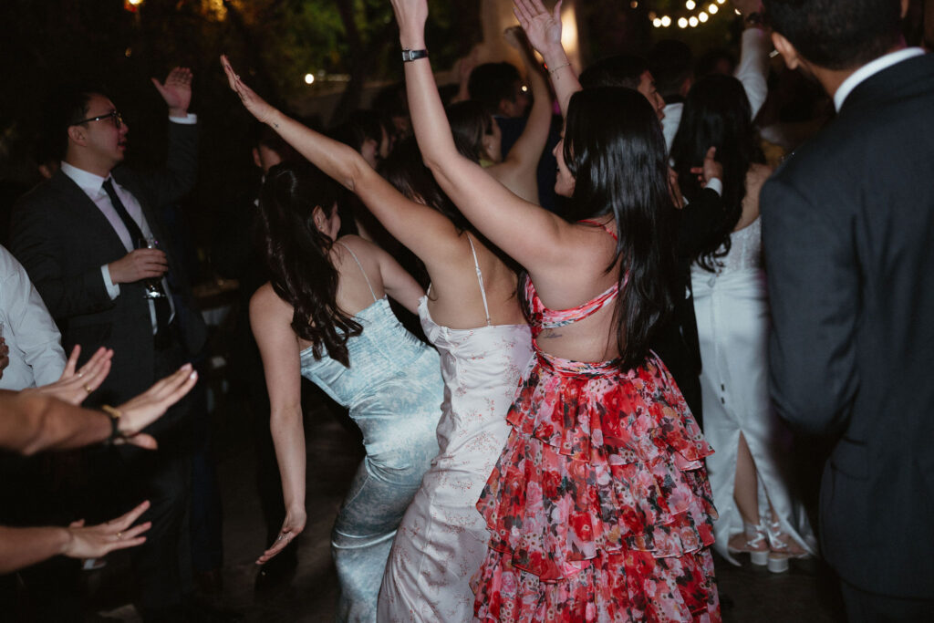 wedding guests having the best time at the reception party