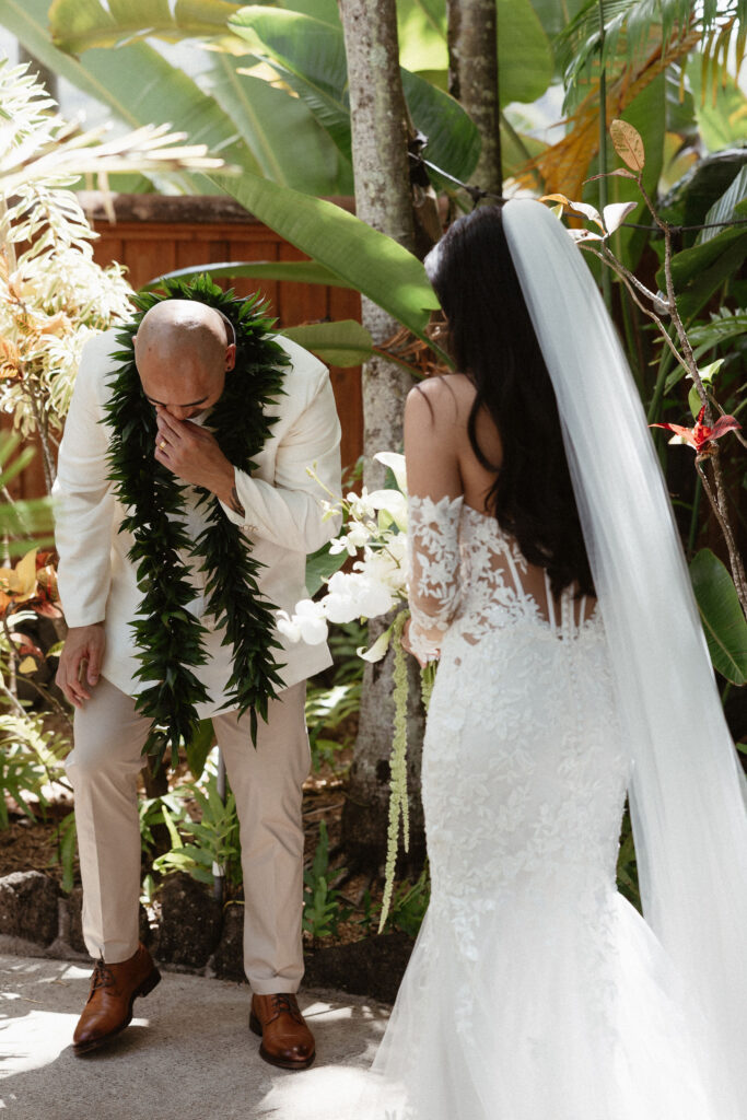groom emotional during his first look with the bride