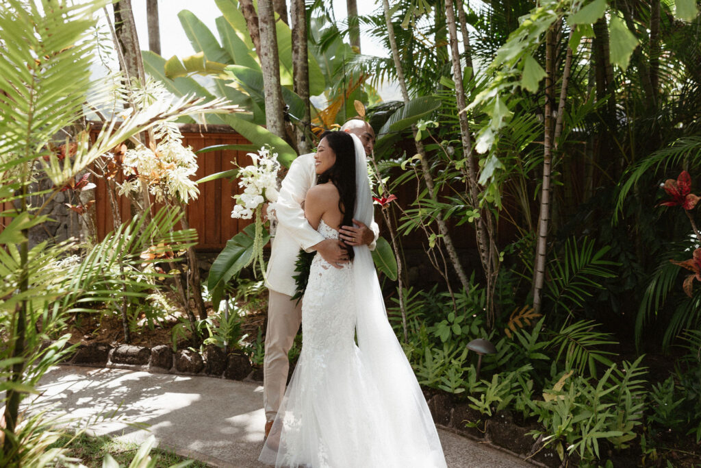 bride and groom hugging after their first look