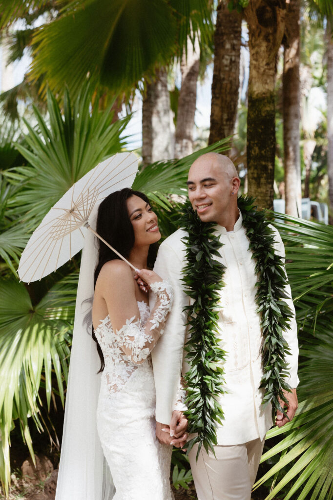 cute picture of the bride and groom laughing with each other during their bridal photos