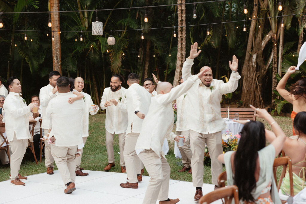 wedding guests dancing at the fun reception party