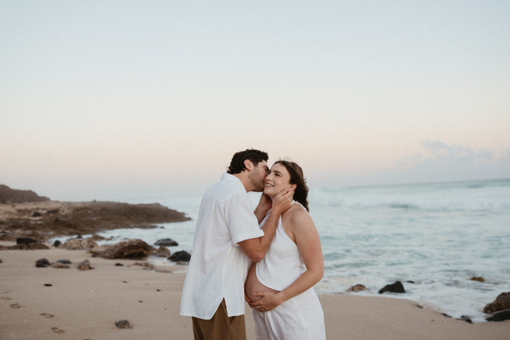 husband kissing his wife on the cheek
