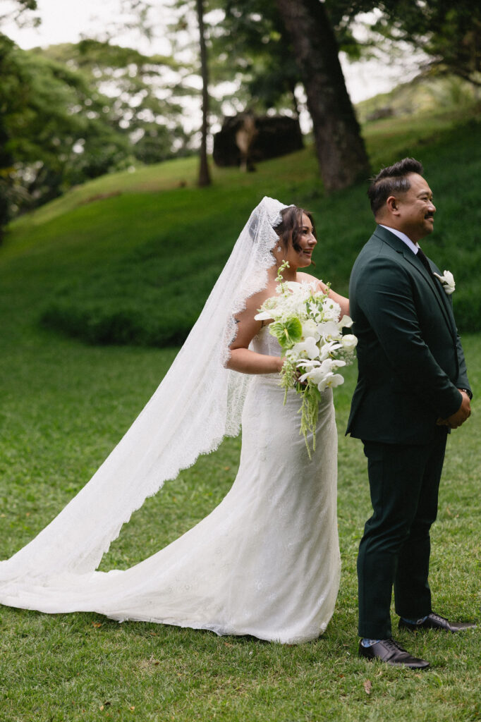 bride and groom at their first look