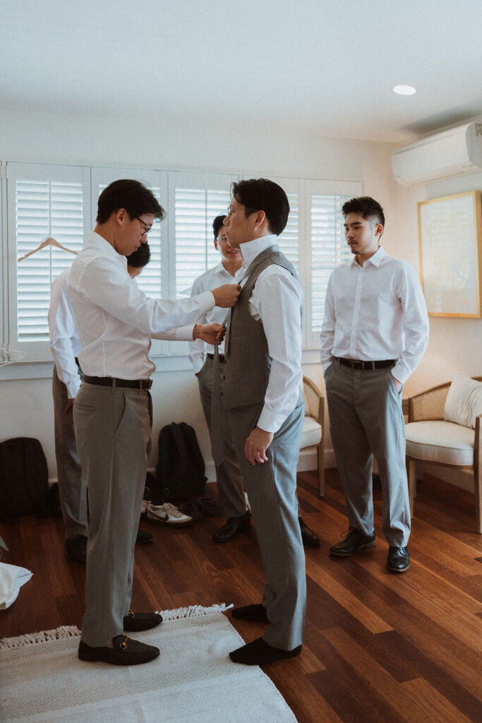 groom before his first look with the bride