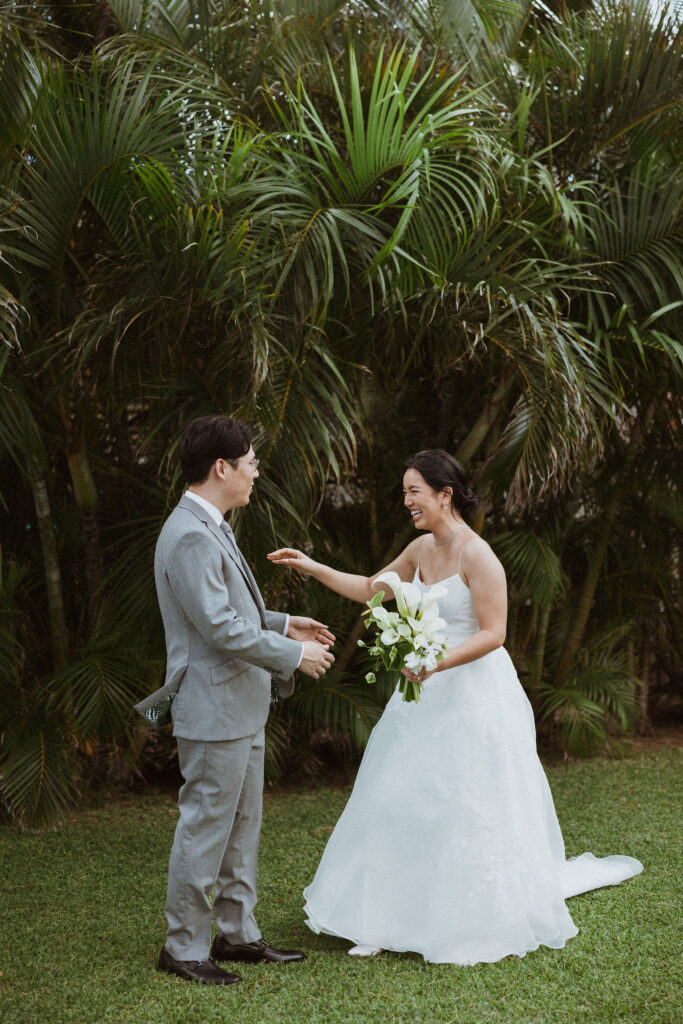 groom emotional seeing the bride in her wedding dress