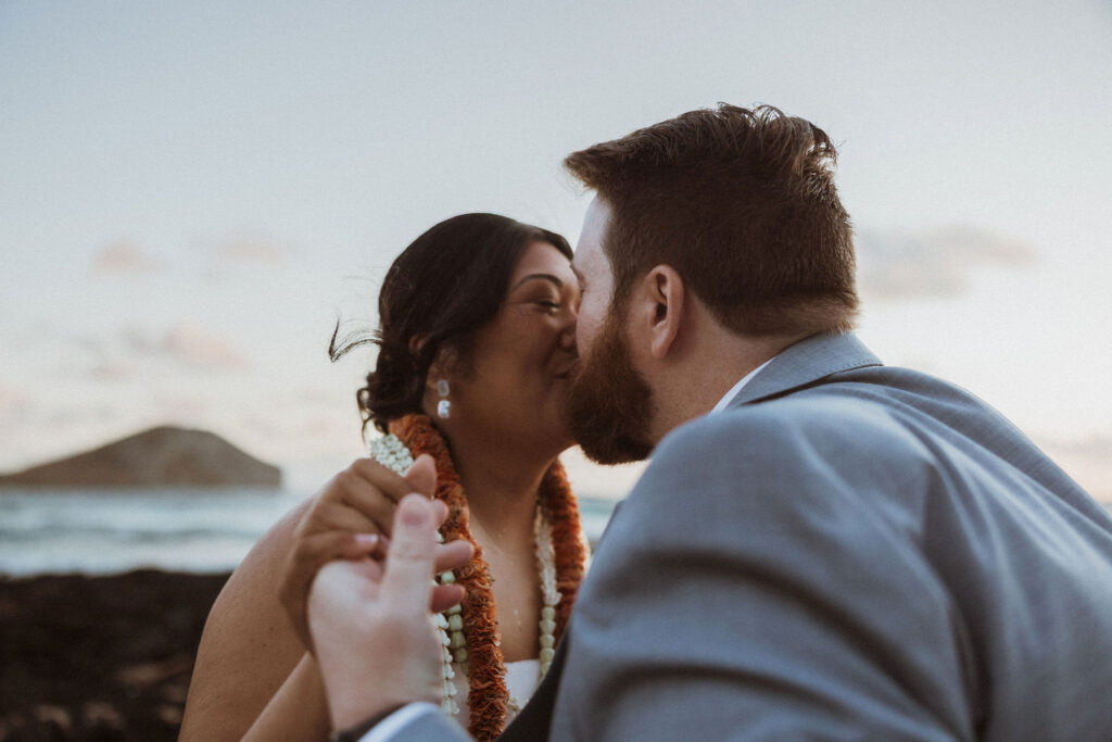 cute picture of the couple kissing after their vows