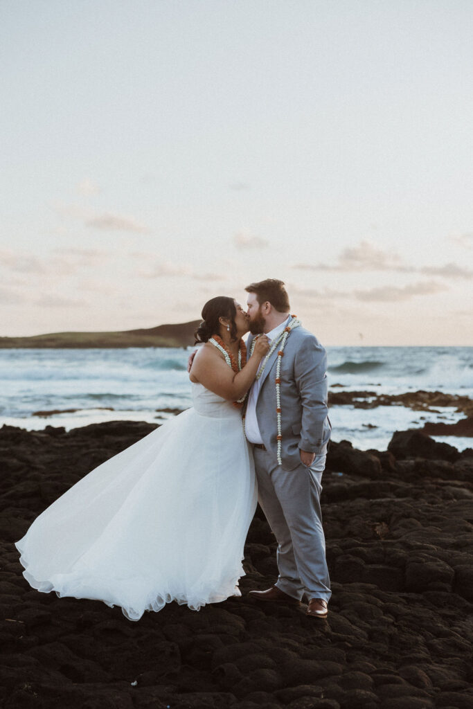 cute picture of the bride and groom kissing