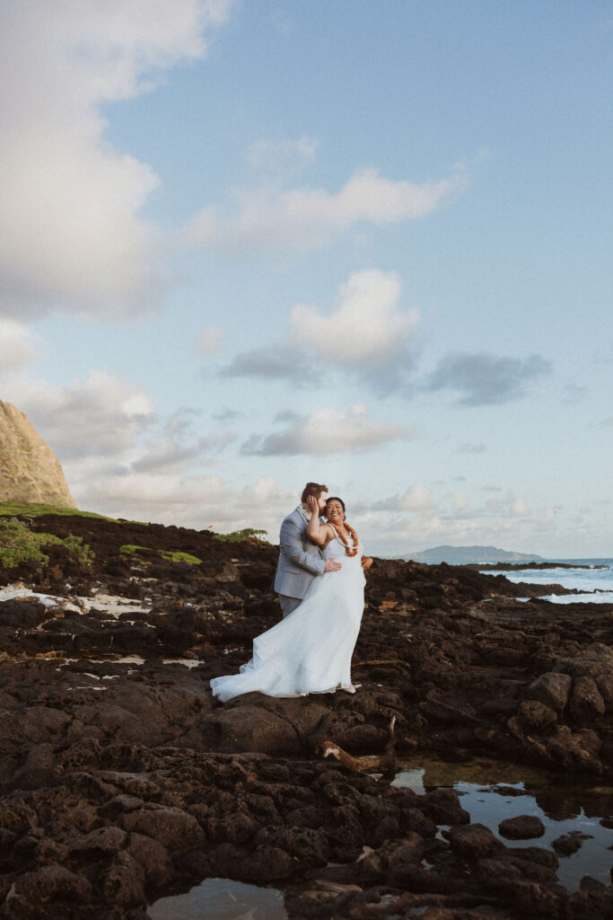 cute picture of the bride and groom hugging
