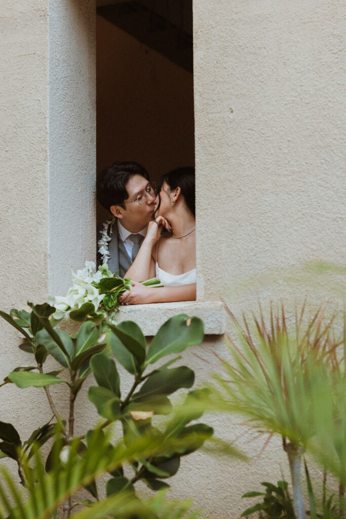 picture of the bride and groom kissing