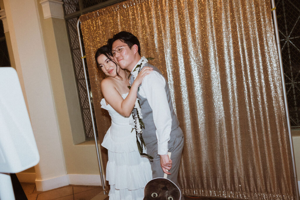 cute portrait of the bride and groom hugging