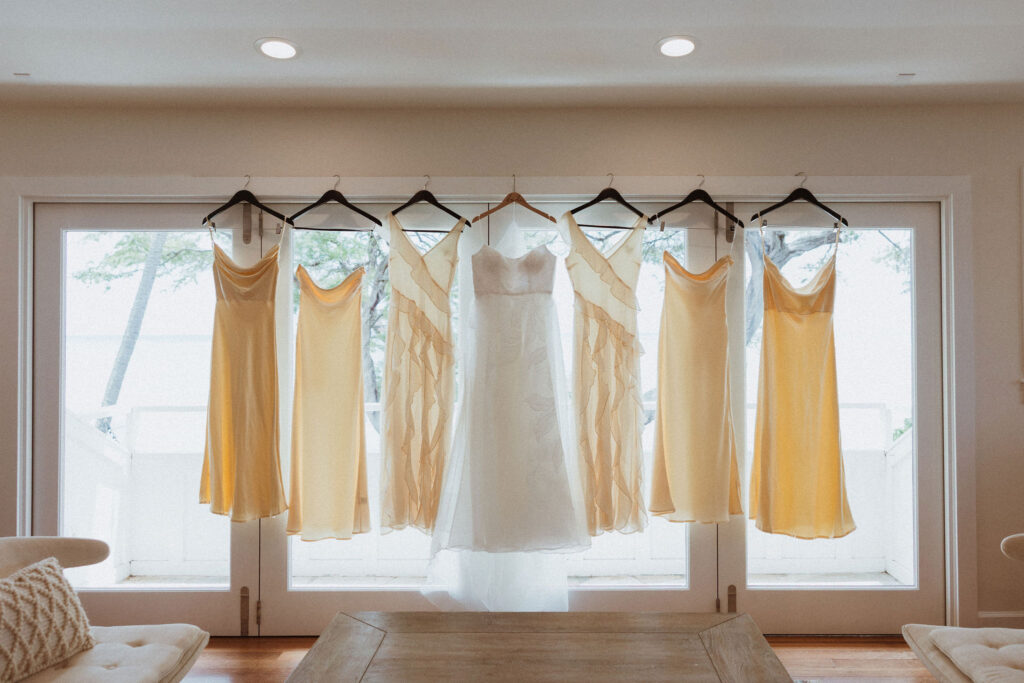 cute picture of the wedding dress and the bridesmaids dresses