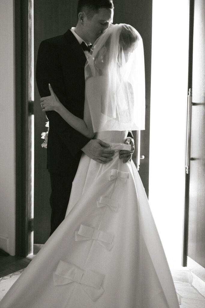 cute picture of the bride and groom smiling at each other