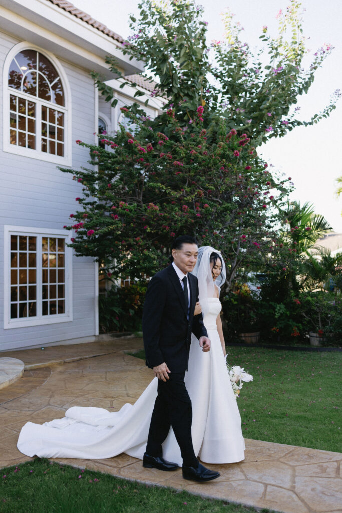 cute picture of the bride walking down the aisle