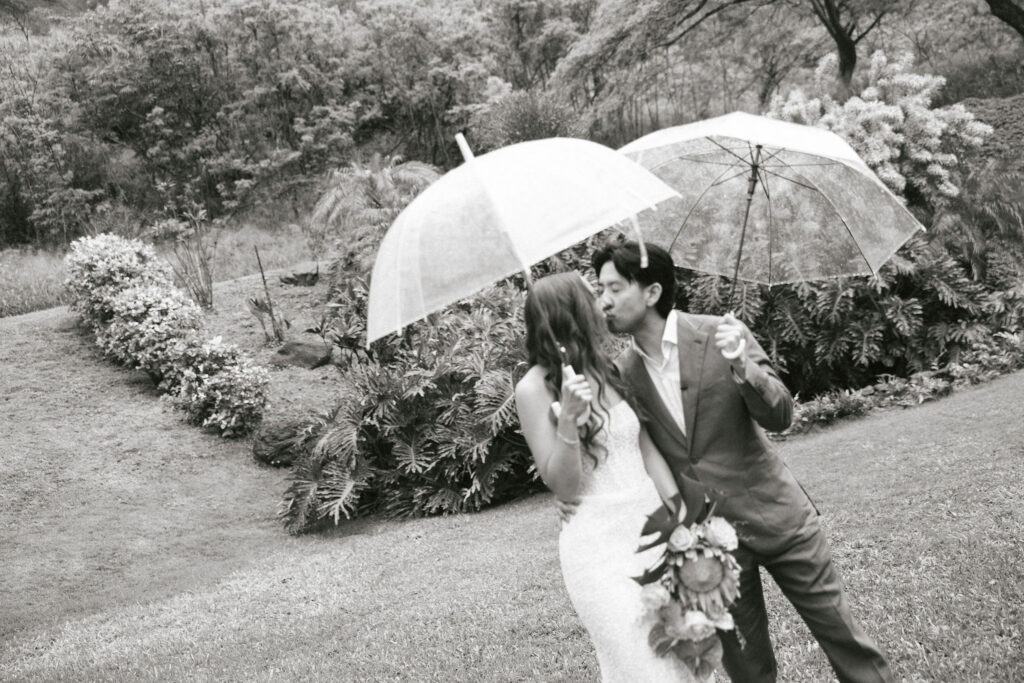 romantic portrait of the bride and groom kissing