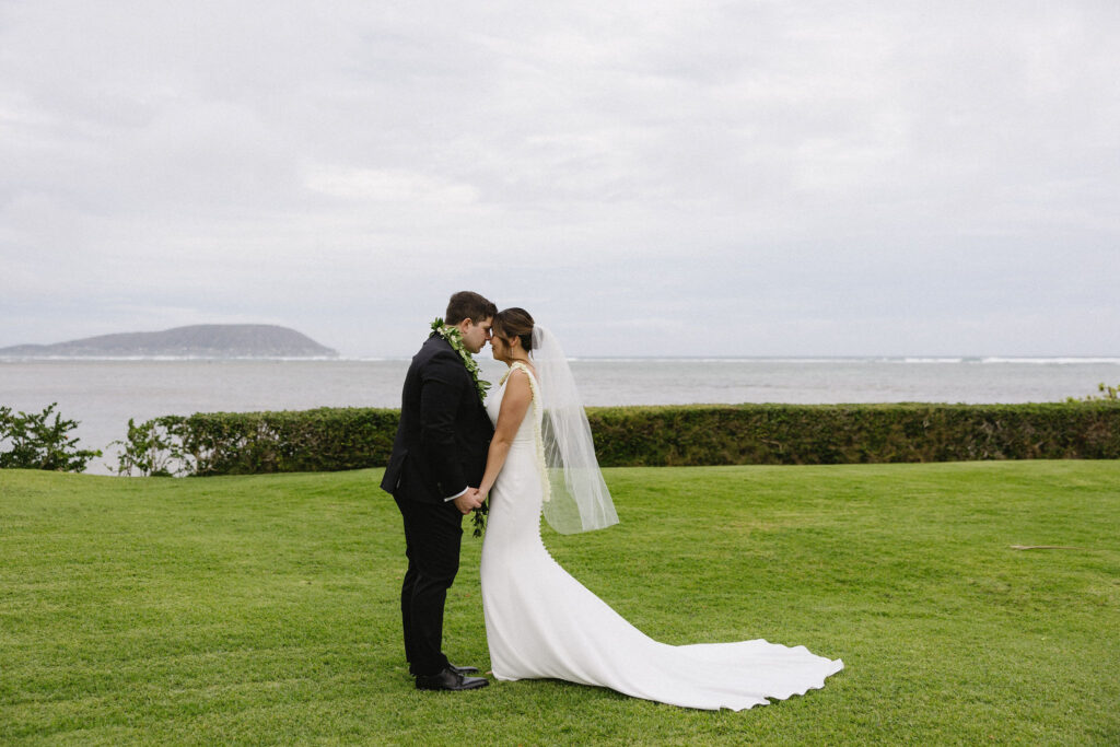 cute picture of the newlyweds smiling at each other