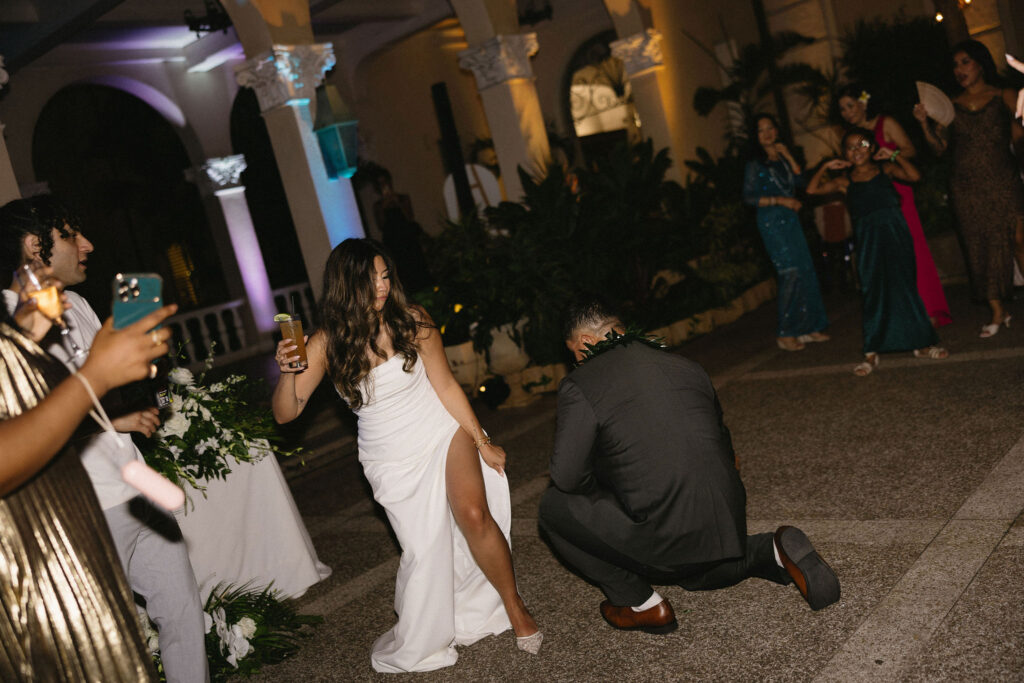 newlyweds at their fun wedding reception party