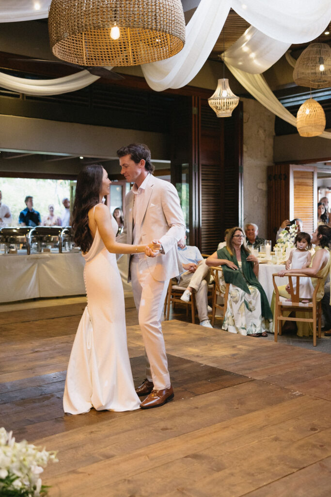 newlyweds dancing at their wedding reception