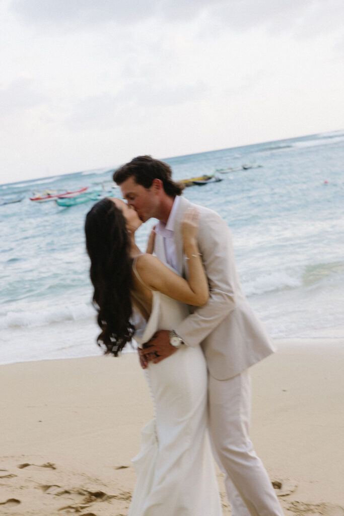 cute picture of the newlyweds kissing