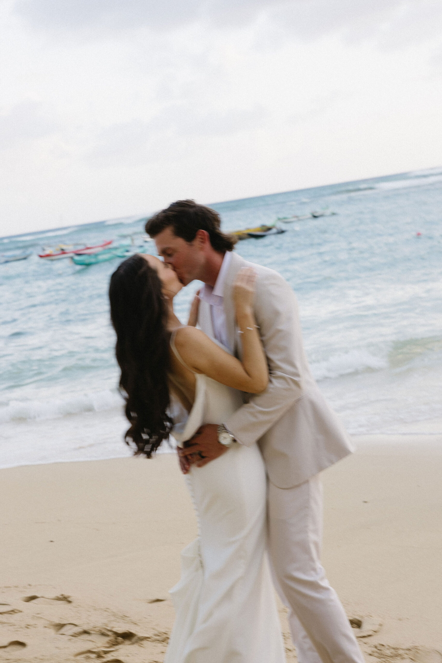 cute picture of the newlyweds kissing