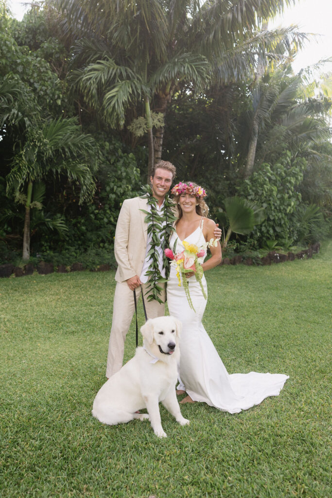 newlyweds smiling at the camera during their bridal session