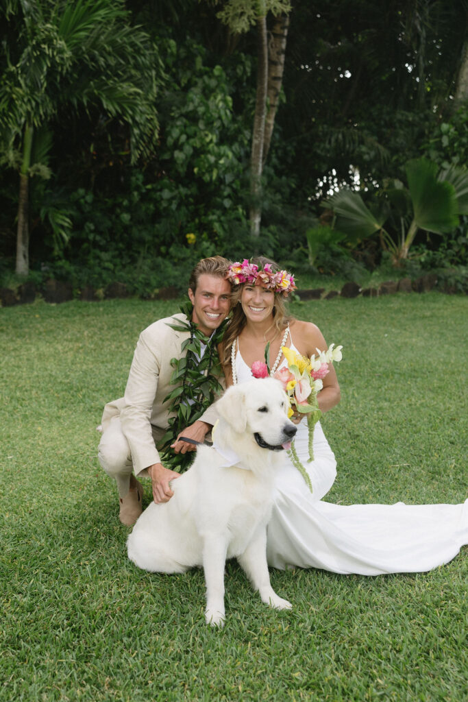 cute picture of the newlyweds with their dogs