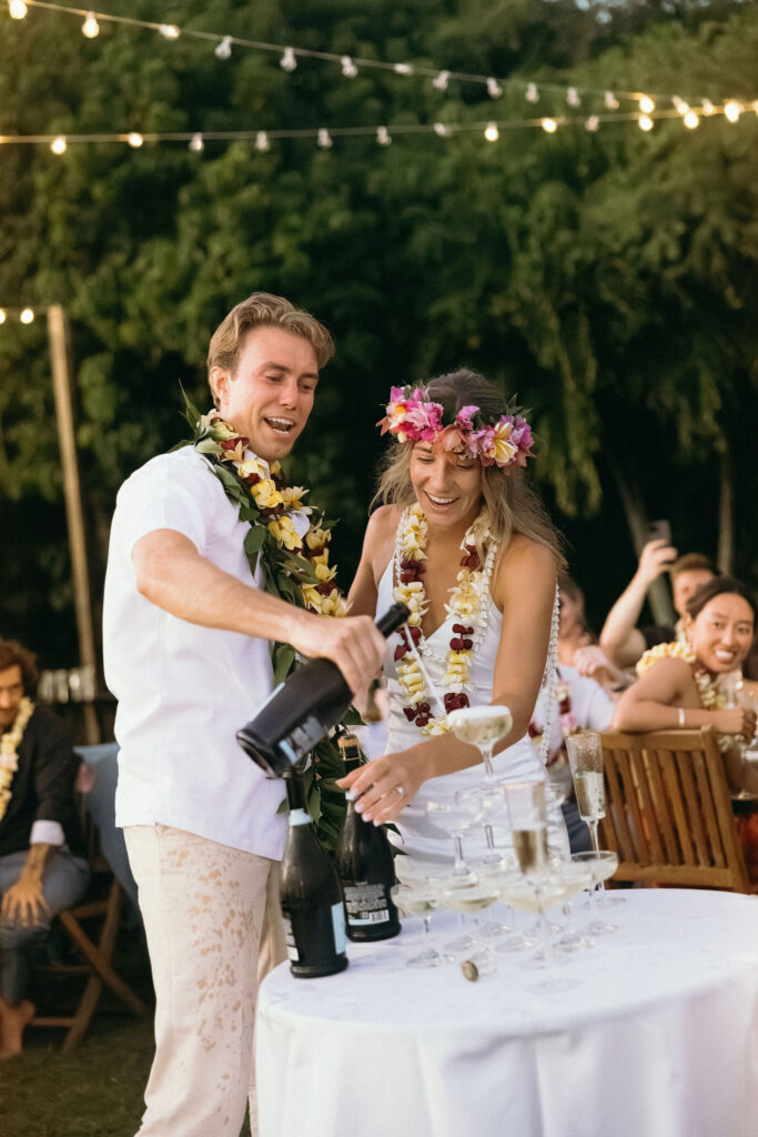 newlyweds celebrating their wedding day with champagne