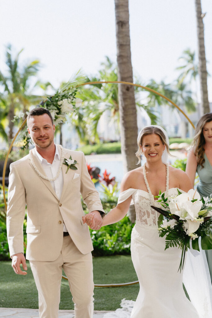 newlyweds heading to their wedding ceremony