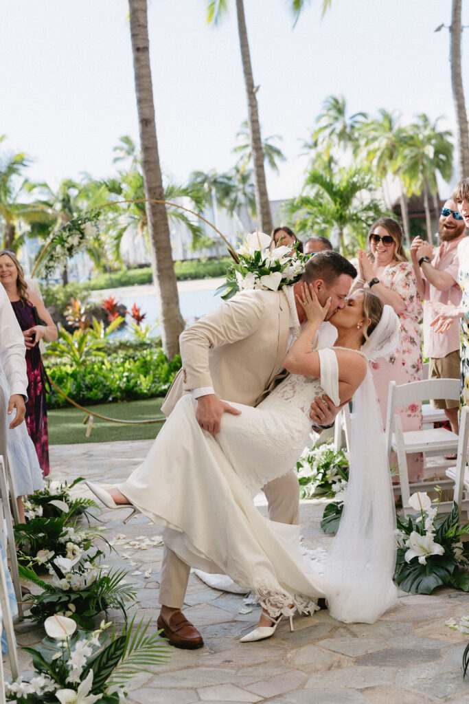 cute picture of the newlyweds kissing