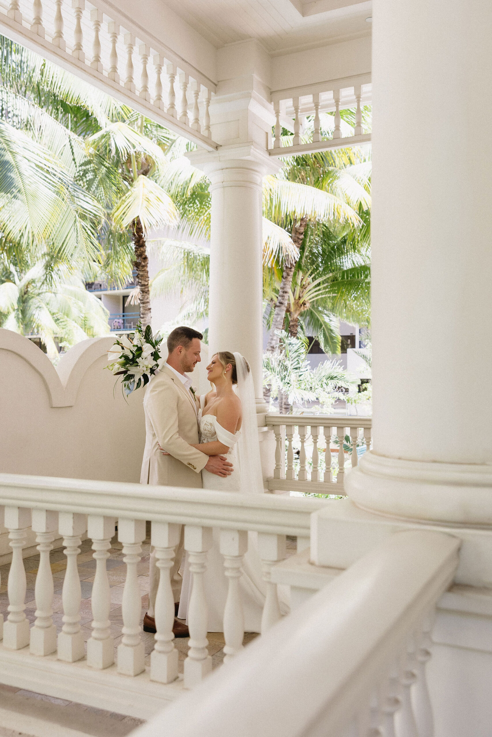 couple smiling at each other during their photoshoot