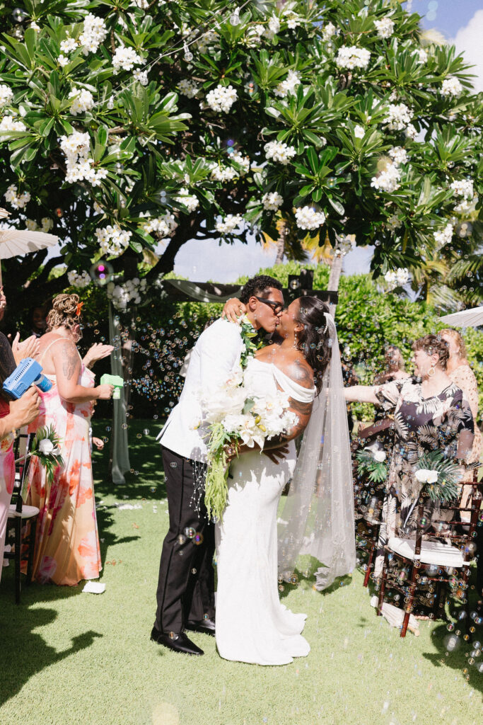 cute picture of the newlyweds kissing