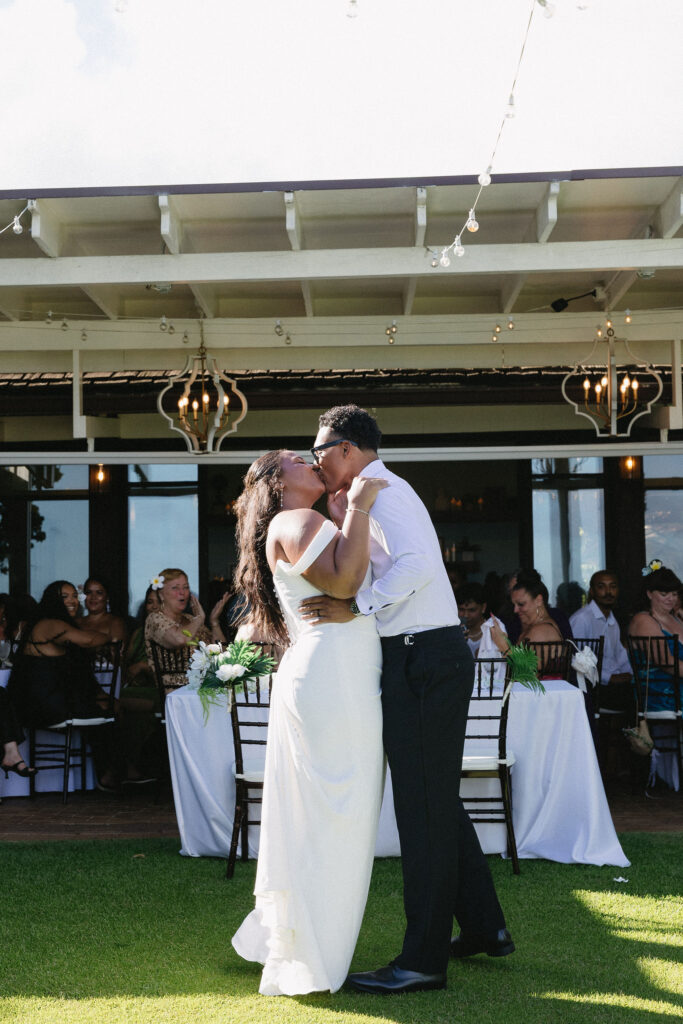 newlyweds at their first dance at their wedding reception