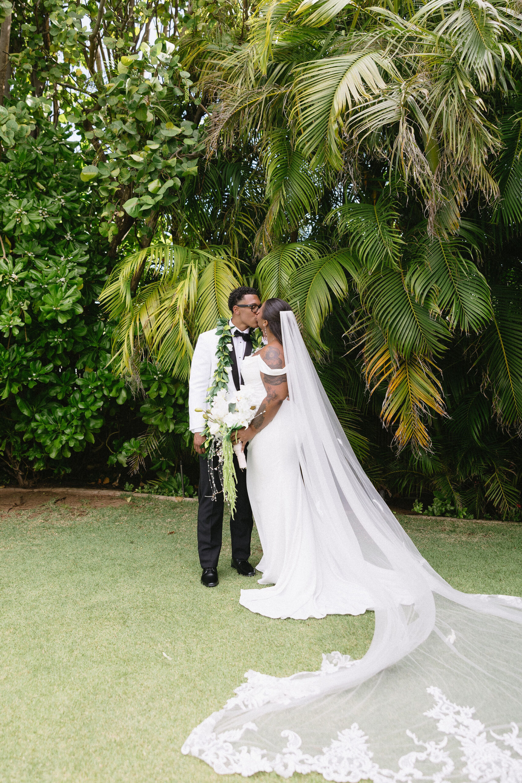cute picture of the newlyweds kissing